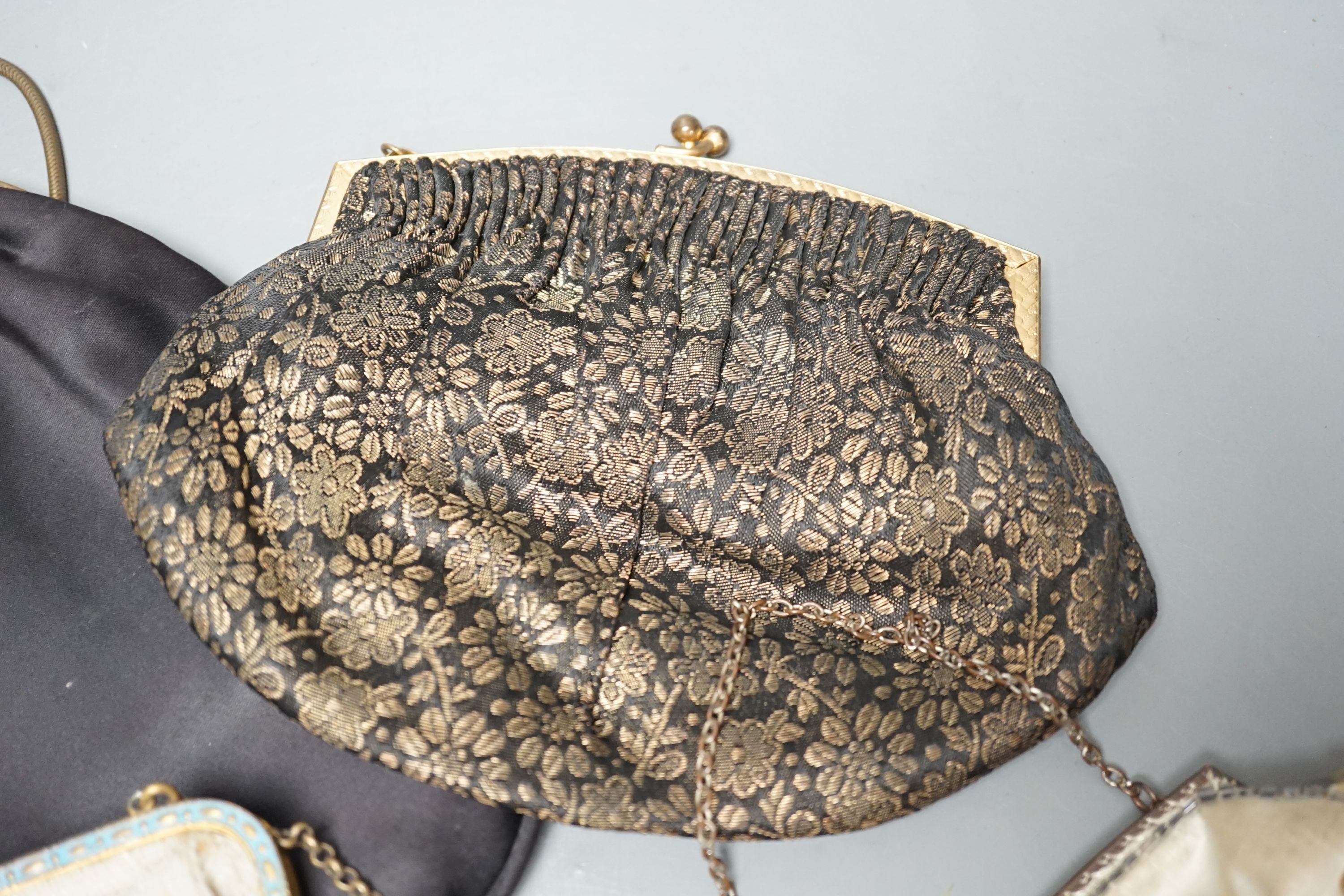 A beaded and embroidered evening bag, a similar sequinned bag and two others